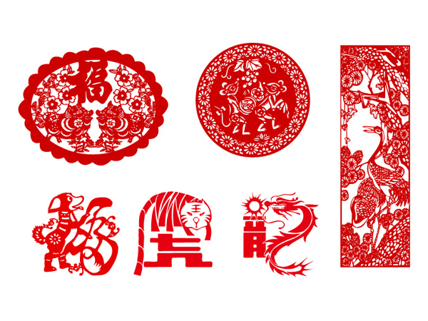 Paper-cut animals - pigs, crane, dog